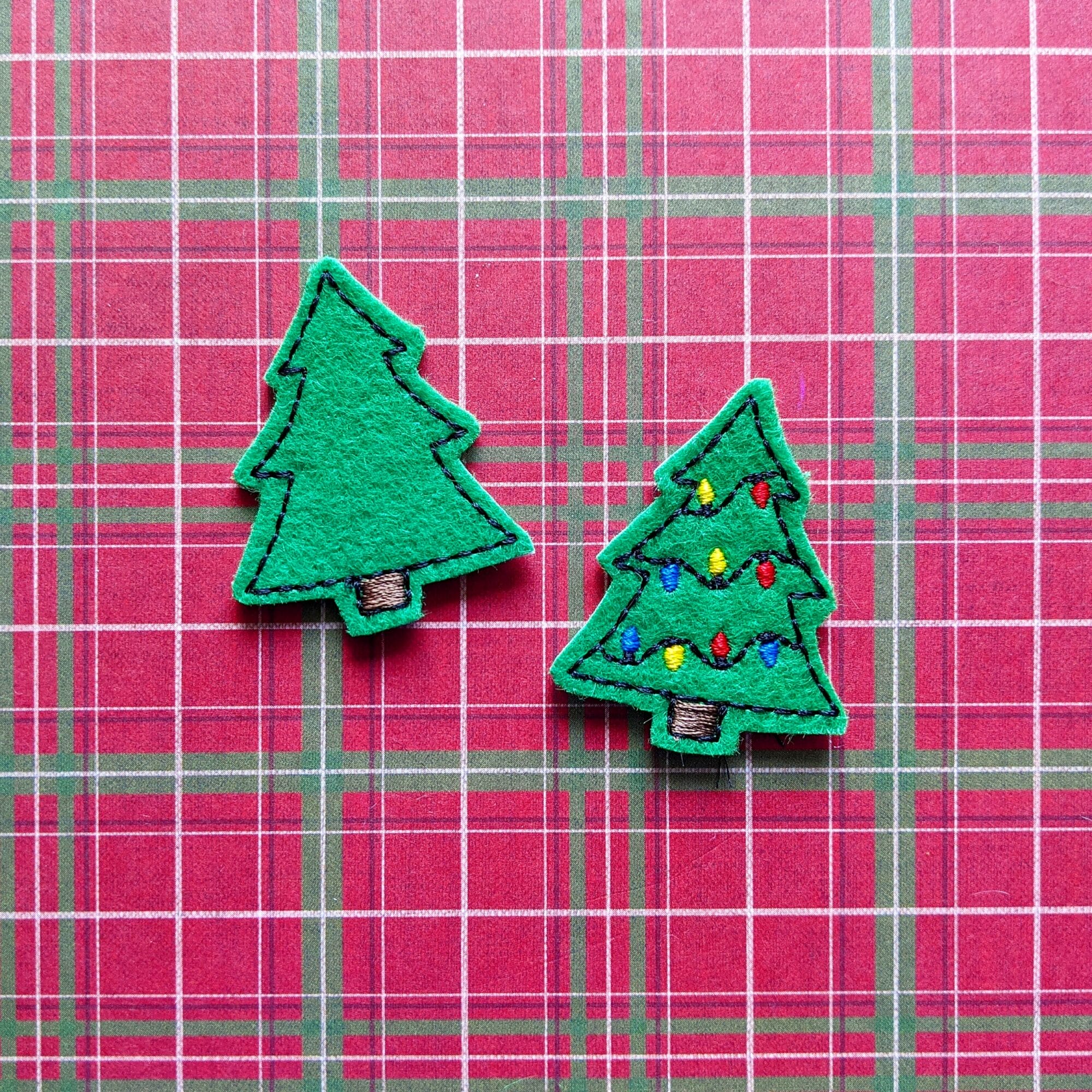 https://cdn.designsbylittlebee.com/media.designsbylittlebee.com/wp-content/uploads/2021/11/15120119/christmas-tree-felties-dlb-scaled.jpg?strip=all&lossy=1&ssl=1