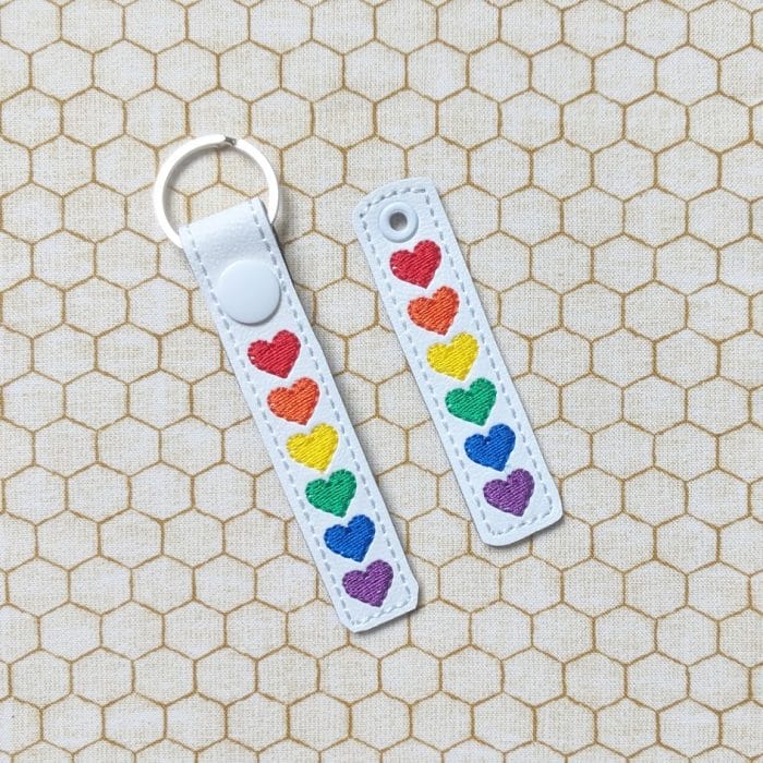 Rainbow Hearts Snap Tab & Eyelet Fob - May 2019