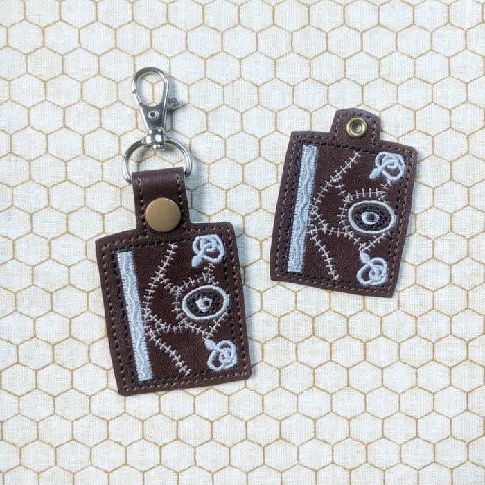 Spell Book Snap Tab & Eyelet Key Fob Set - September 2019