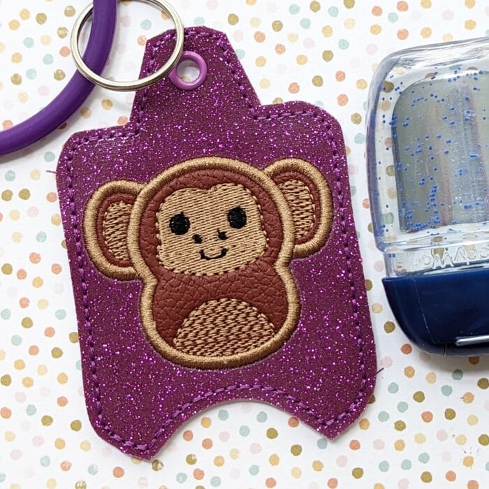 Pudgy Monkey Hand Sanitizer Case - Snap Tab and Eyelet Key Fob